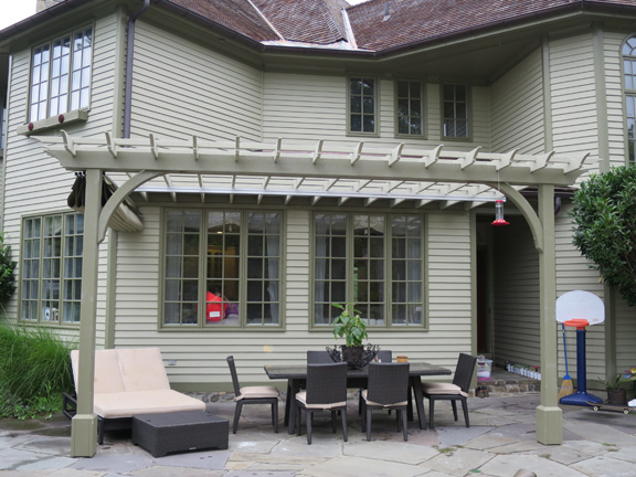 Attached post and beam pergola