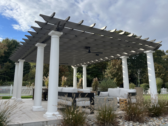 A simple pergola beside a pool