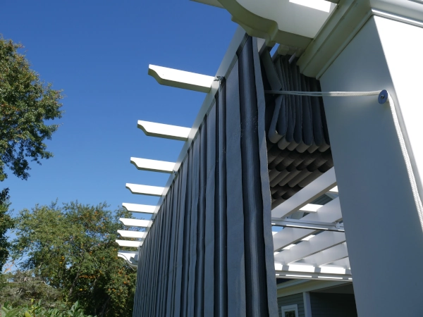 A simple fiberglass pergola beside a pool